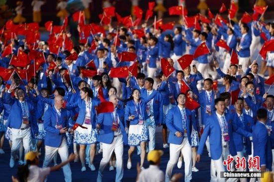 資料圖：9月23日，杭州第19屆亞運會開幕式舉行。中國代表團身著星辰藍禮服驚艷亮相。<a target='_blank' href='/'><p align=